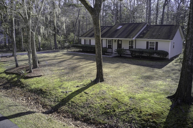 single story home featuring driveway