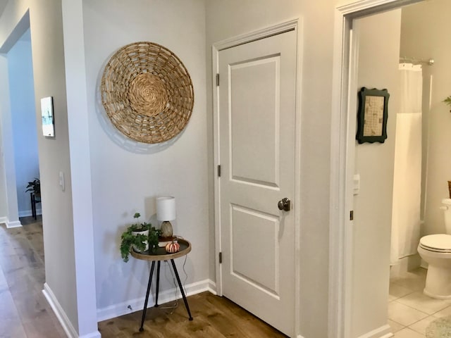 hallway with light tile patterned flooring