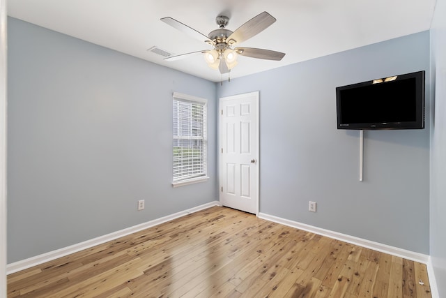 1245 Lakefront Dr, Charleston, SC 29412 - unfurnished bedroom featuring light wood finished floors, baseboards, and ceiling fan