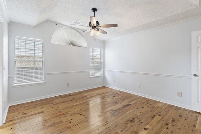 1245 Lakefront Dr, Charleston, SC 29412 - unfurnished room with a textured ceiling, ceiling fan, hardwood / wood-style floors, crown molding, and baseboards
