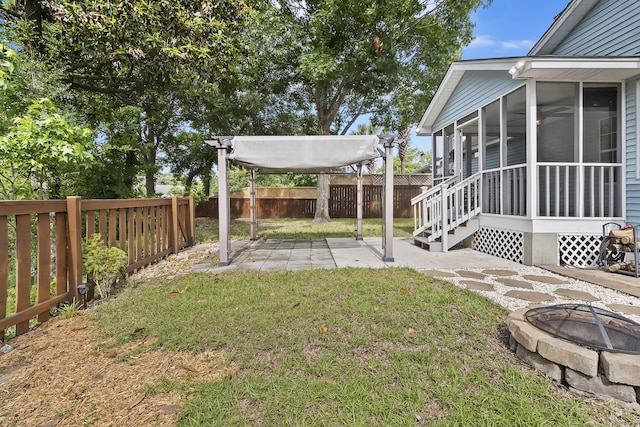 1245 Lakefront Dr, Charleston, SC 29412 - view of yard with a sunroom, an outdoor fire pit, and a patio