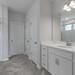bathroom with concrete flooring