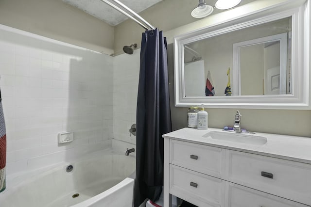 full bathroom featuring shower / bath combo and vanity