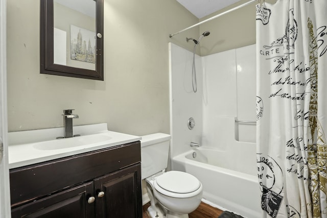 bathroom with wood finished floors, shower / bath combo, vanity, and toilet