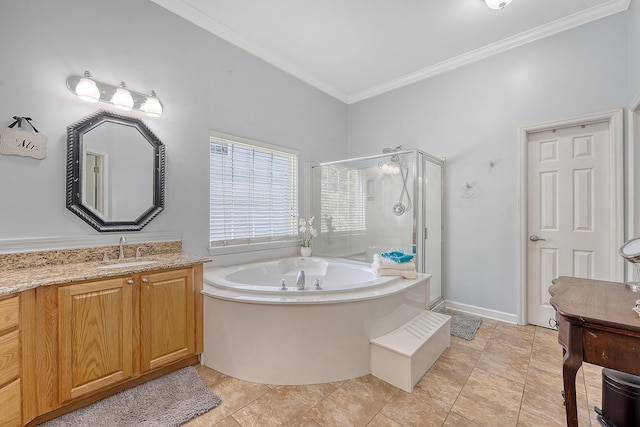 bathroom featuring vanity, stone finish flooring, ornamental molding, a garden tub, and a stall shower