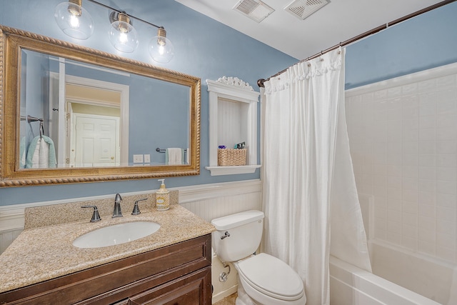bathroom with visible vents, shower / bath combo with shower curtain, toilet, and vanity
