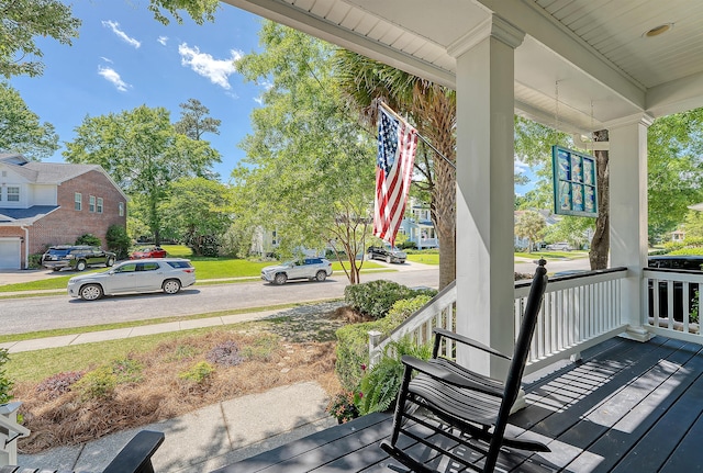 wooden deck featuring a porch