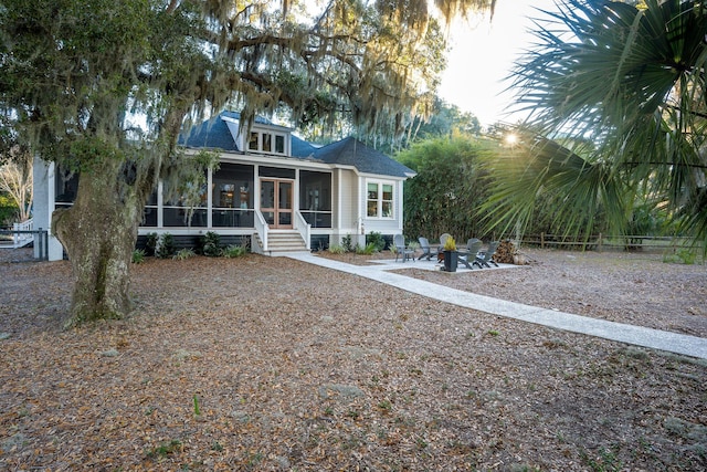 view of front of property with a sunroom