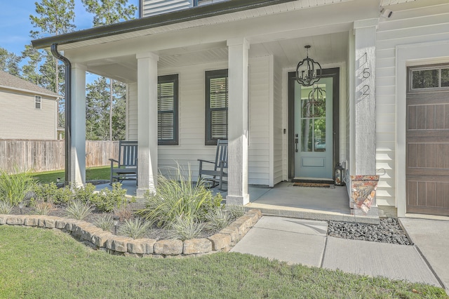 entrance to property featuring a porch