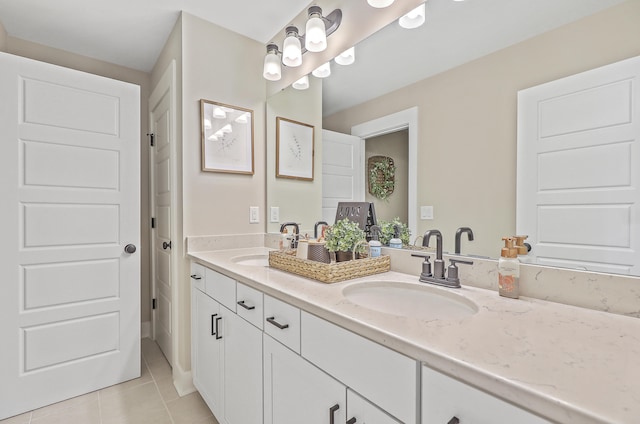 bathroom featuring vanity and tile patterned flooring