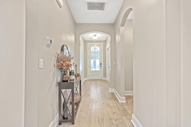 entryway with light hardwood / wood-style flooring