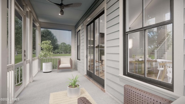 sunroom with ceiling fan