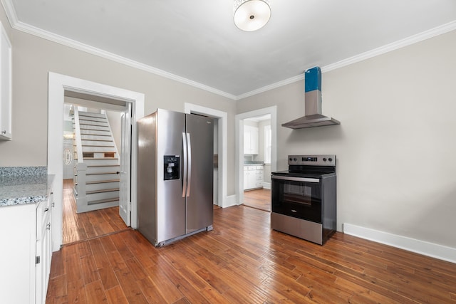 kitchen featuring wall chimney exhaust hood, white cabinetry, dark hardwood / wood-style flooring, stainless steel appliances, and light stone countertops