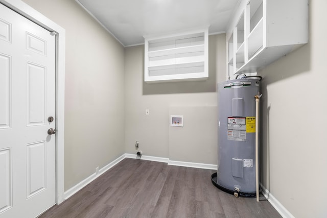 laundry room featuring hardwood / wood-style flooring, hookup for a washing machine, and electric water heater