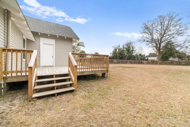 view of yard with a wooden deck