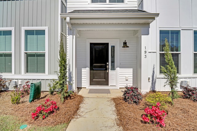 doorway to property with a porch