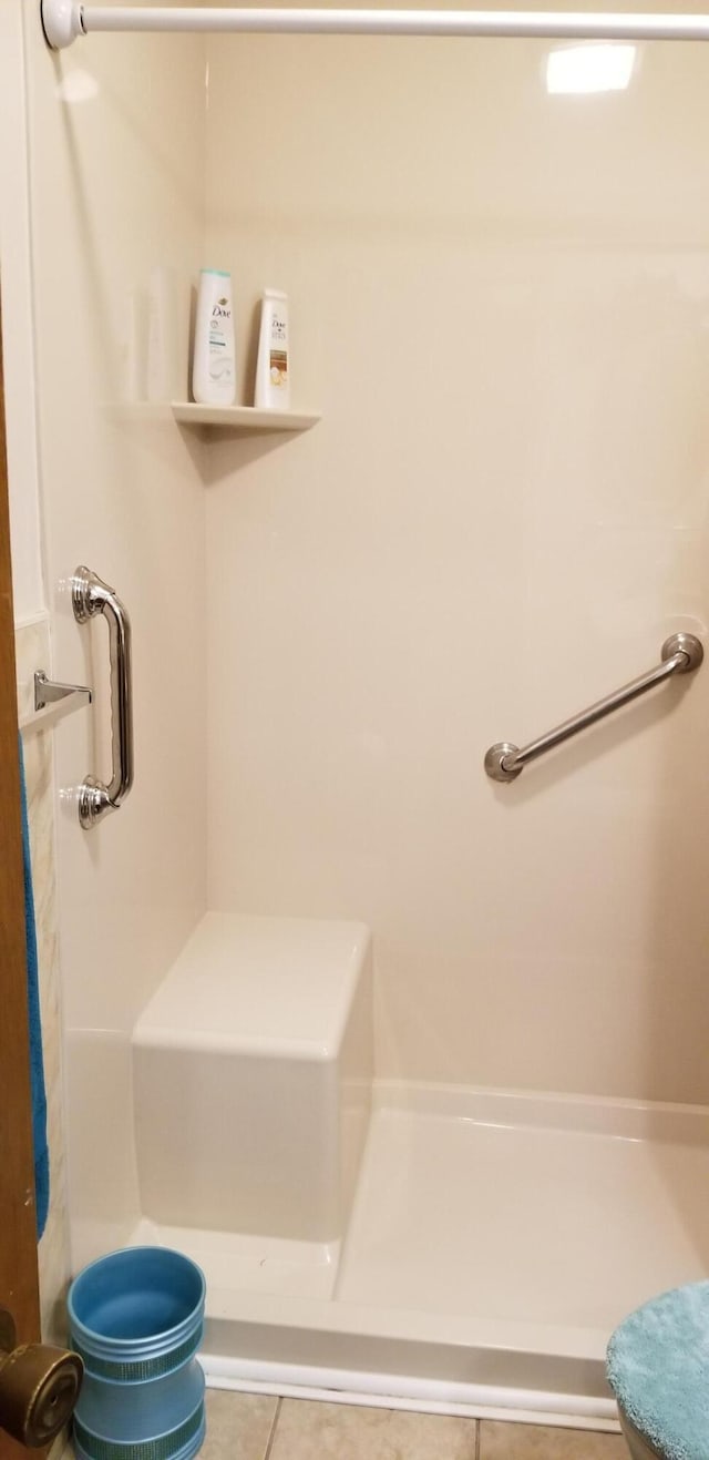 107 Kelly St, Walterboro, SC 29488 - full bathroom featuring a stall shower and tile patterned flooring