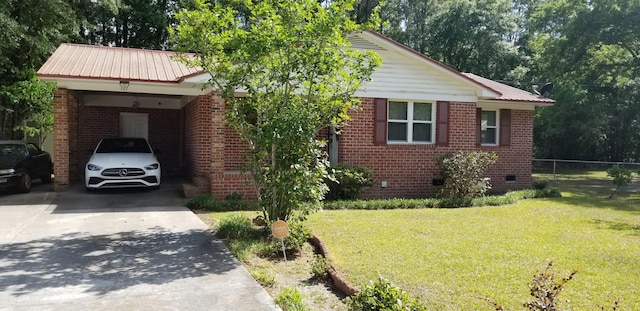 107 Kelly St, Walterboro, SC 29488 - ranch-style house featuring concrete driveway, a front yard, brick siding, and crawl space