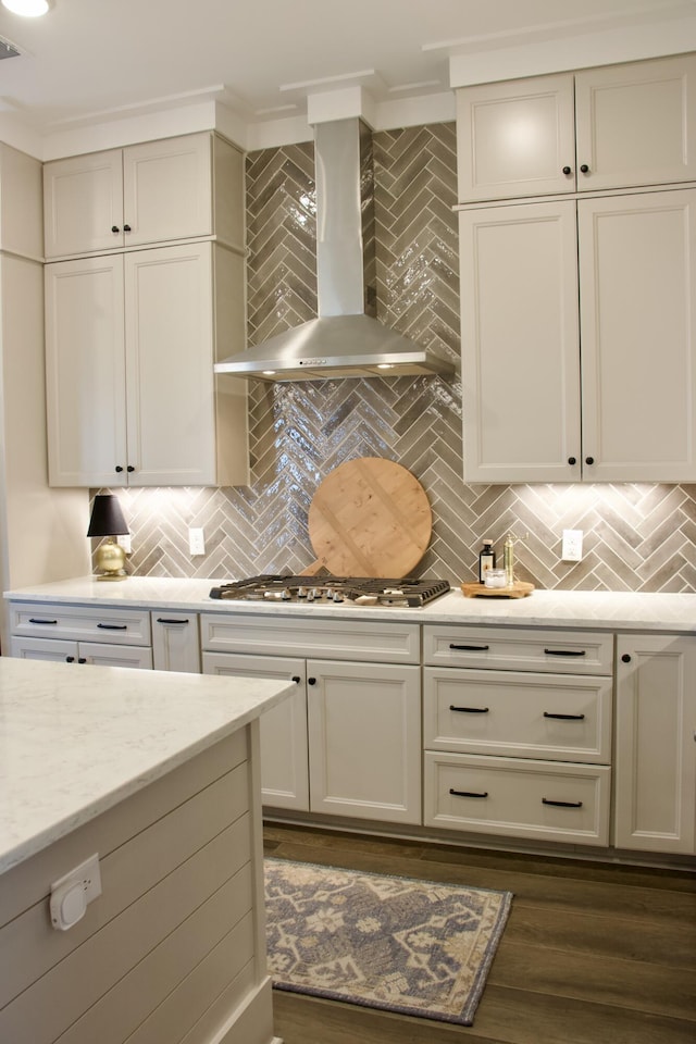 1723 Bolden Dr, Mount Pleasant, SC 29466 - kitchen with wall chimney exhaust hood, ornamental molding, stainless steel gas stovetop, tasteful backsplash, and dark wood-type flooring