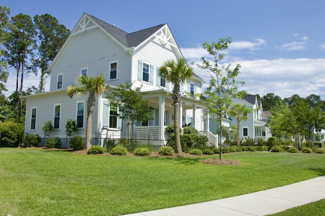 1723 Bolden Dr, Mount Pleasant, SC 29466 - view of front of house featuring covered porch and a front yard