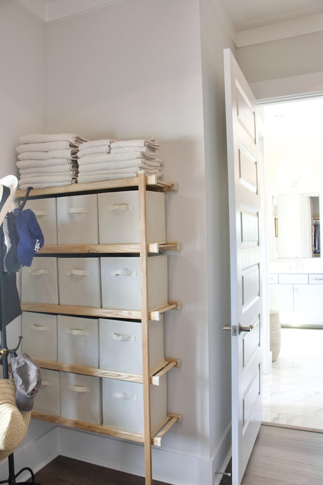 1723 Bolden Dr, Mount Pleasant, SC 29466 - detailed view of wood finished floors, a sink, and crown molding