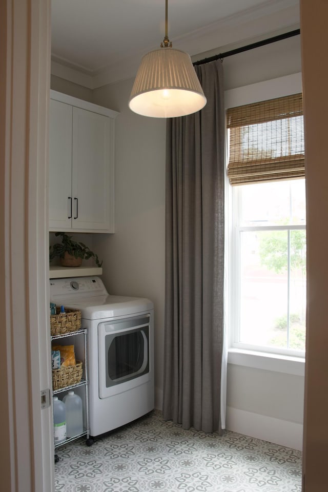1723 Bolden Dr, Mount Pleasant, SC 29466 - laundry room with washer / clothes dryer, cabinet space, crown molding, and light floors