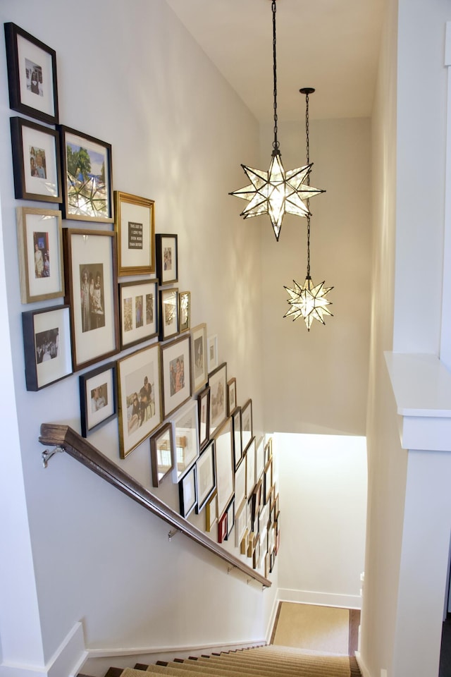 1723 Bolden Dr, Mount Pleasant, SC 29466 - stairway with a chandelier and baseboards