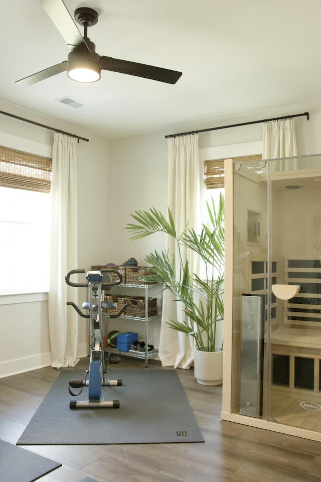 1723 Bolden Dr, Mount Pleasant, SC 29466 - exercise room featuring a ceiling fan, wood finished floors, and baseboards