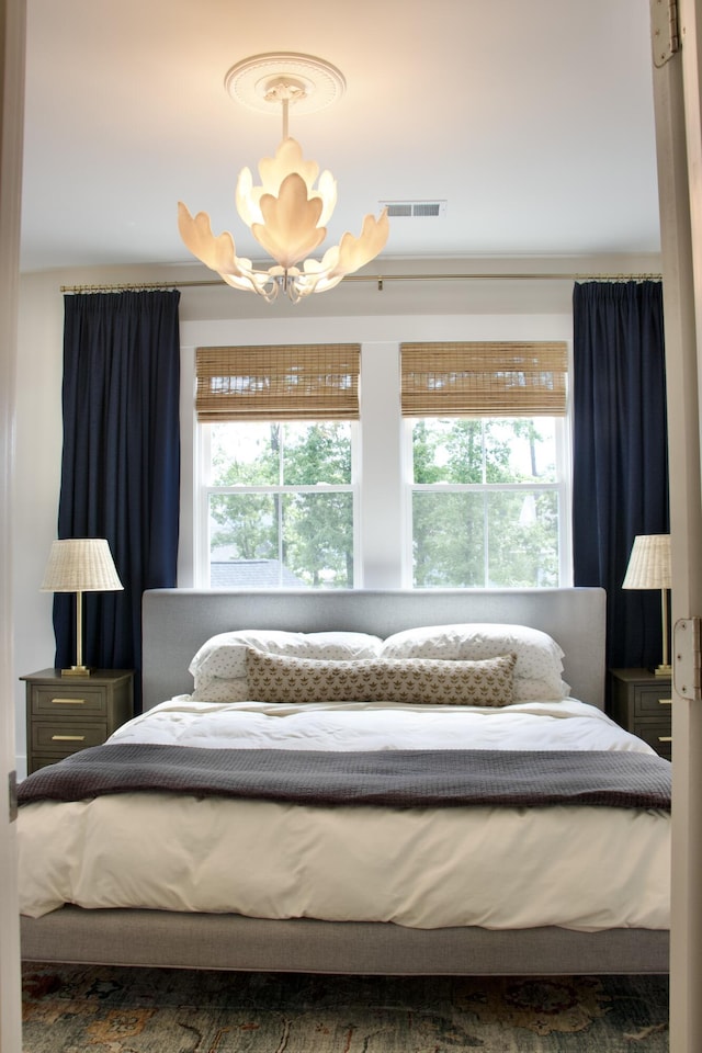 1723 Bolden Dr, Mount Pleasant, SC 29466 - bedroom with a chandelier