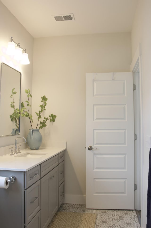 1723 Bolden Dr, Mount Pleasant, SC 29466 - bathroom with vanity, tile patterned flooring, and baseboards