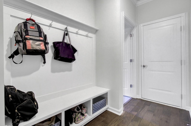 mudroom featuring dark wood-style floors and baseboards