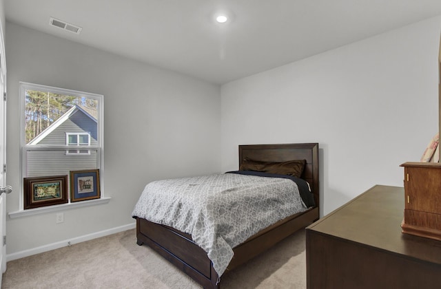 carpeted bedroom with visible vents, recessed lighting, and baseboards