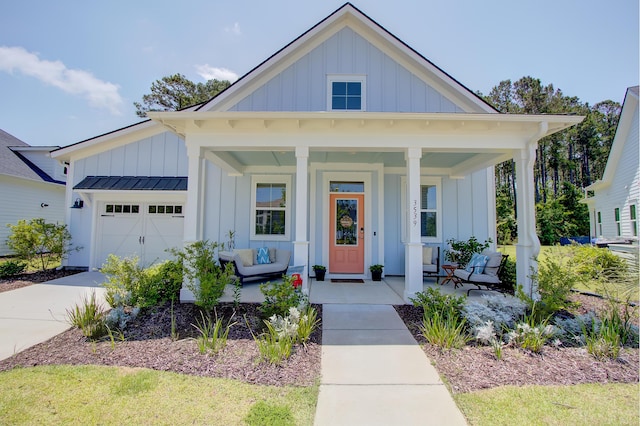 3539 Habenaria Rd Unit 28, Mount Pleasant, SC 29466 - modern inspired farmhouse with board and batten siding, a porch, a garage, and concrete driveway