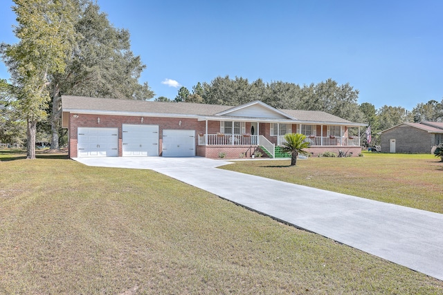 single story home with a front yard, a garage, and a porch