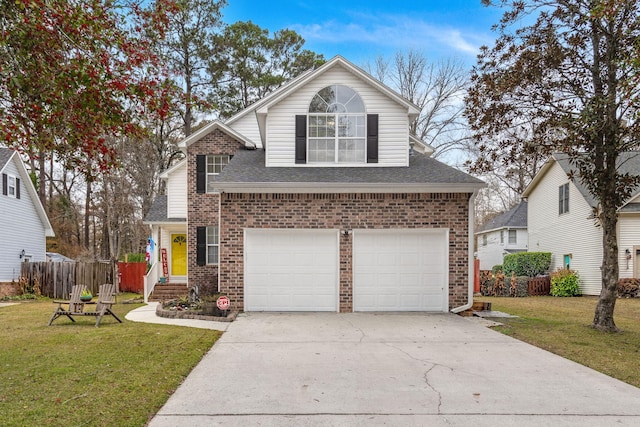 front of property featuring a front yard and a garage