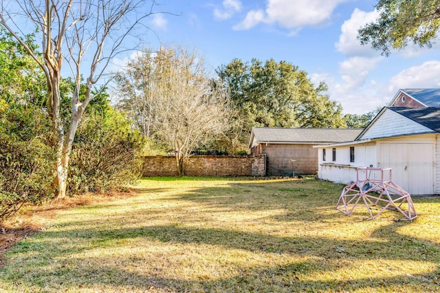 view of yard with fence