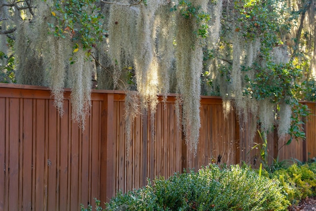 view of gate featuring fence