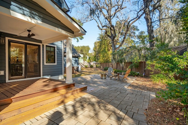 view of patio / terrace with fence and a deck