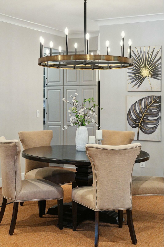 dining area featuring crown molding