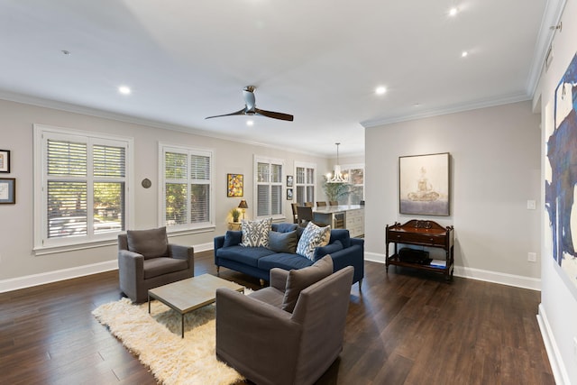 living room featuring dark wood-type flooring, baseboards, ceiling fan with notable chandelier, and recessed lighting
