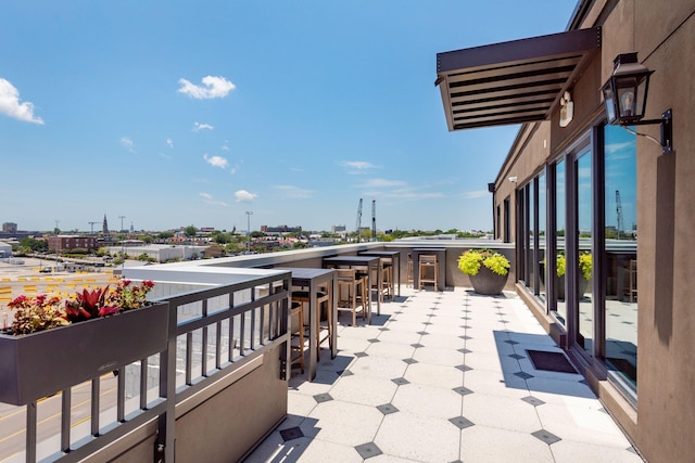 view of patio / terrace with a balcony