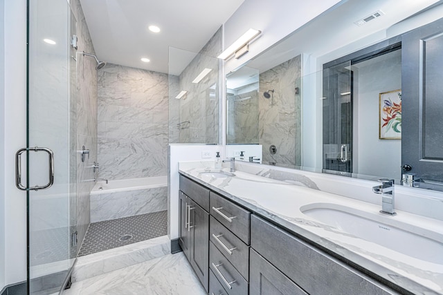 bathroom featuring independent shower and bath and vanity