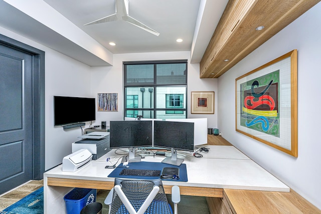 office featuring hardwood / wood-style flooring and ceiling fan