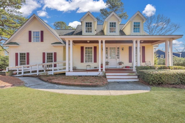 view of front facade featuring a porch and a front yard