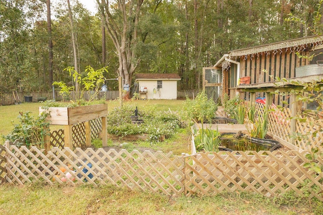 view of yard with a storage unit