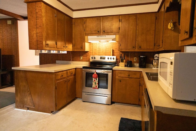 kitchen with stainless steel appliances, a textured ceiling, backsplash, and kitchen peninsula