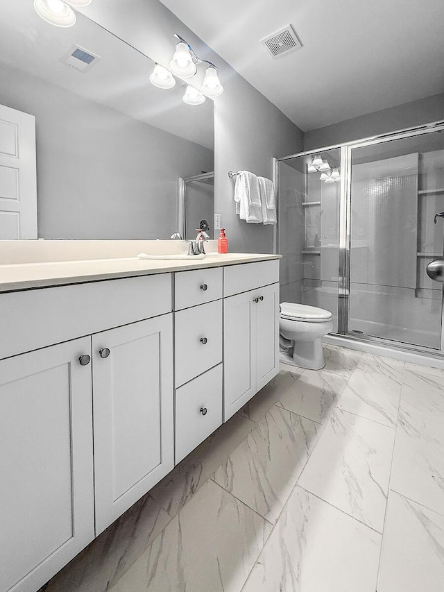 full bath with toilet, marble finish floor, visible vents, and a stall shower