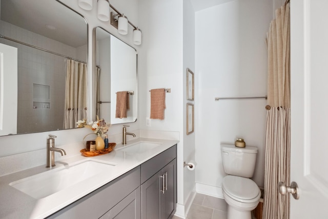 bathroom with curtained shower, tile patterned flooring, vanity, and toilet