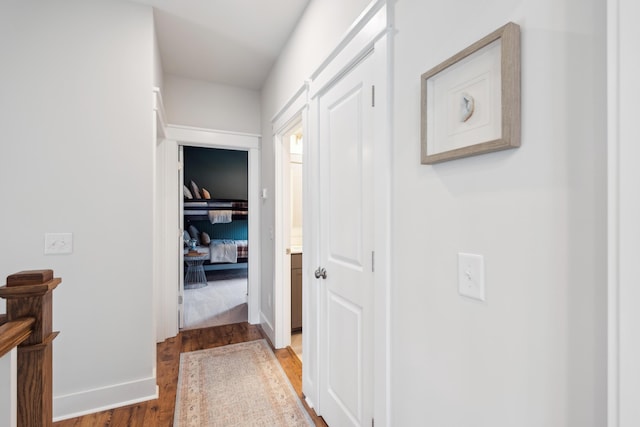 hallway featuring hardwood / wood-style flooring