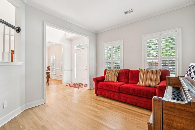 174 Revetment Ln, Mount Pleasant, SC 29464 - living area featuring ornamental molding, light wood-style flooring, and baseboards